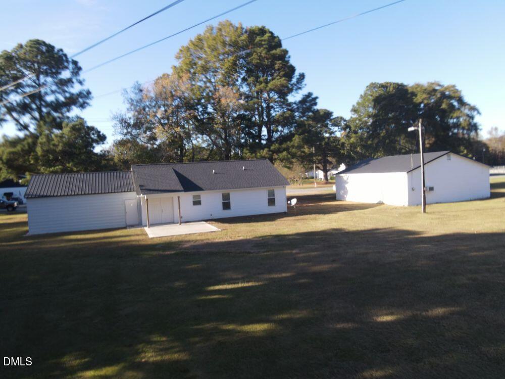 144 Red Hill Church Road Dunn, NC 28334 - Photo 6 of 44 a view of a house with a yard