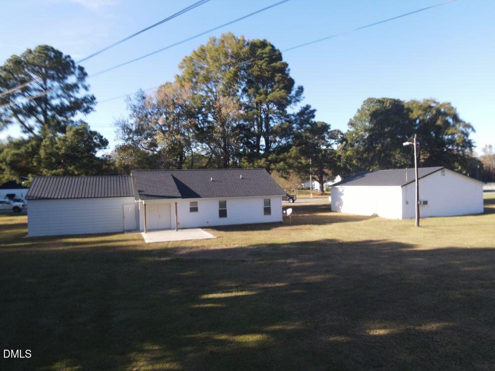 144 Red Hill Church Road Dunn, NC 28334 - Photo 7 of 44 a house view with a outdoor space