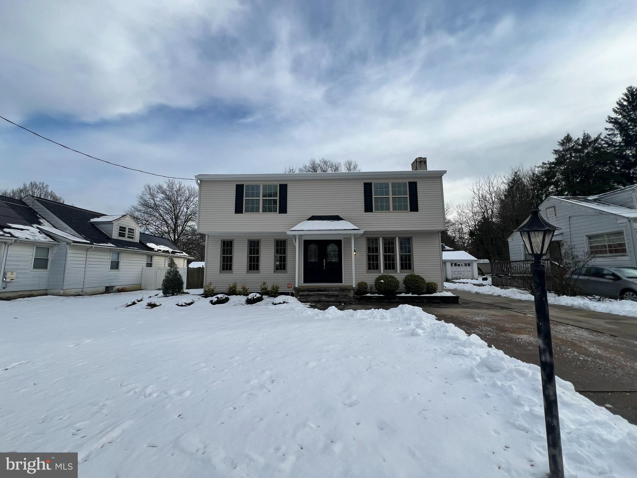 220 Harvard Avenue Stratford, NJ 08084 - Photo 2 of 33 a view of a building with a street