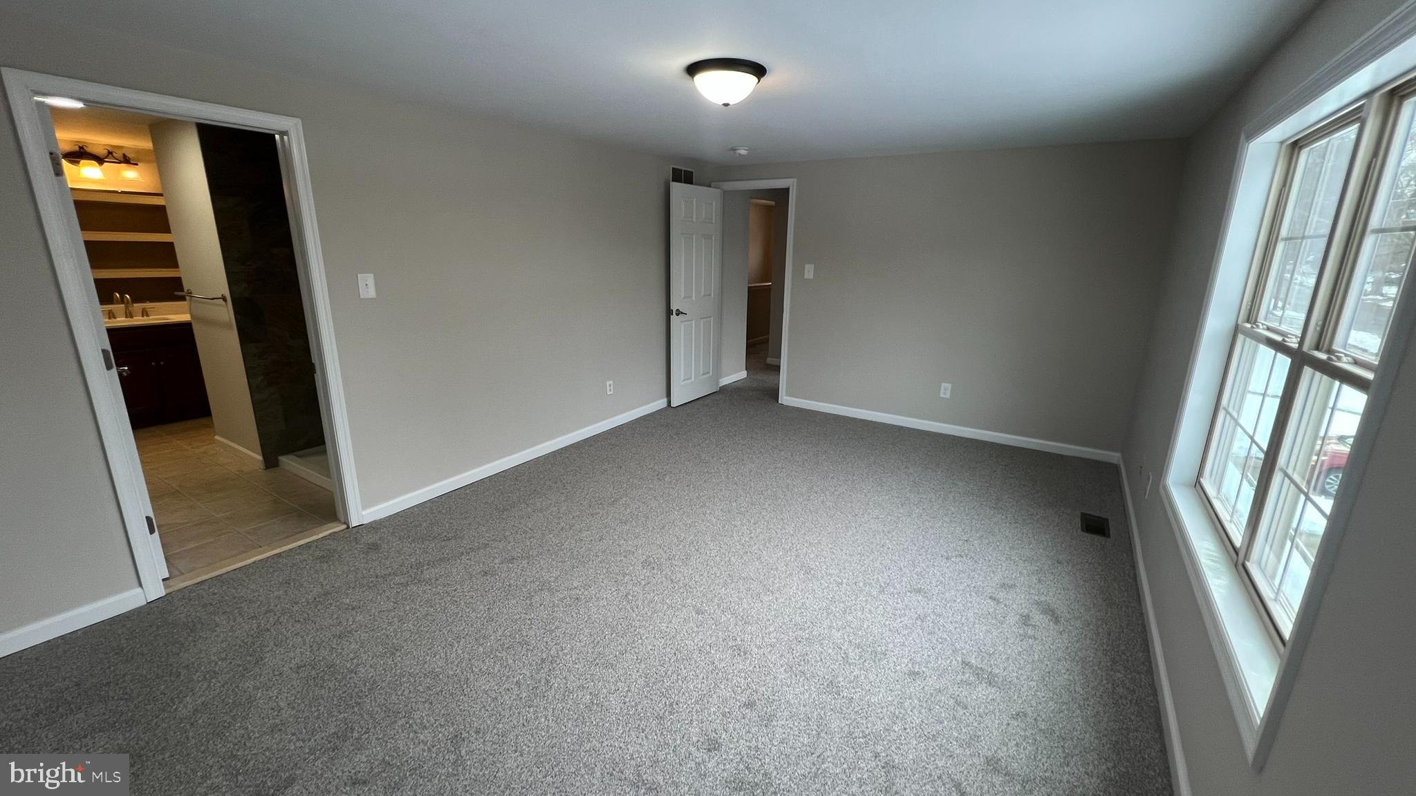 220 Harvard Avenue Stratford, NJ 08084 - Photo 23 of 33 an empty room with windows