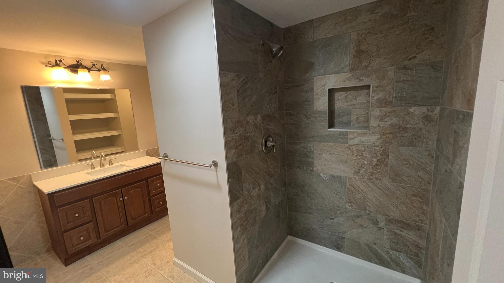 220 Harvard Avenue Stratford, NJ 08084 - Photo 25 of 33 a bathroom with a granite countertop sink toilet and shower