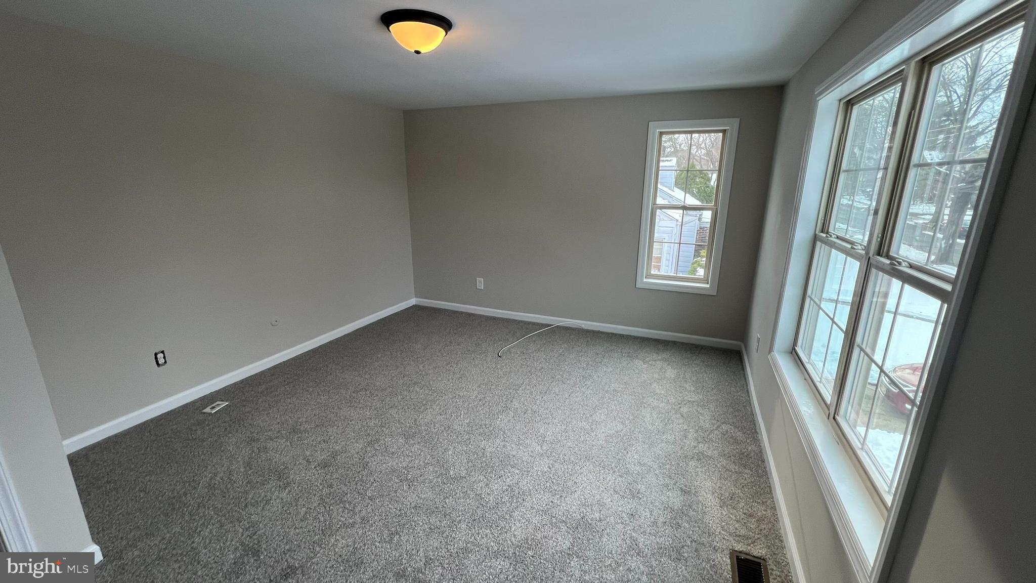 220 Harvard Avenue Stratford, NJ 08084 - Photo 26 of 33 an empty room with windows