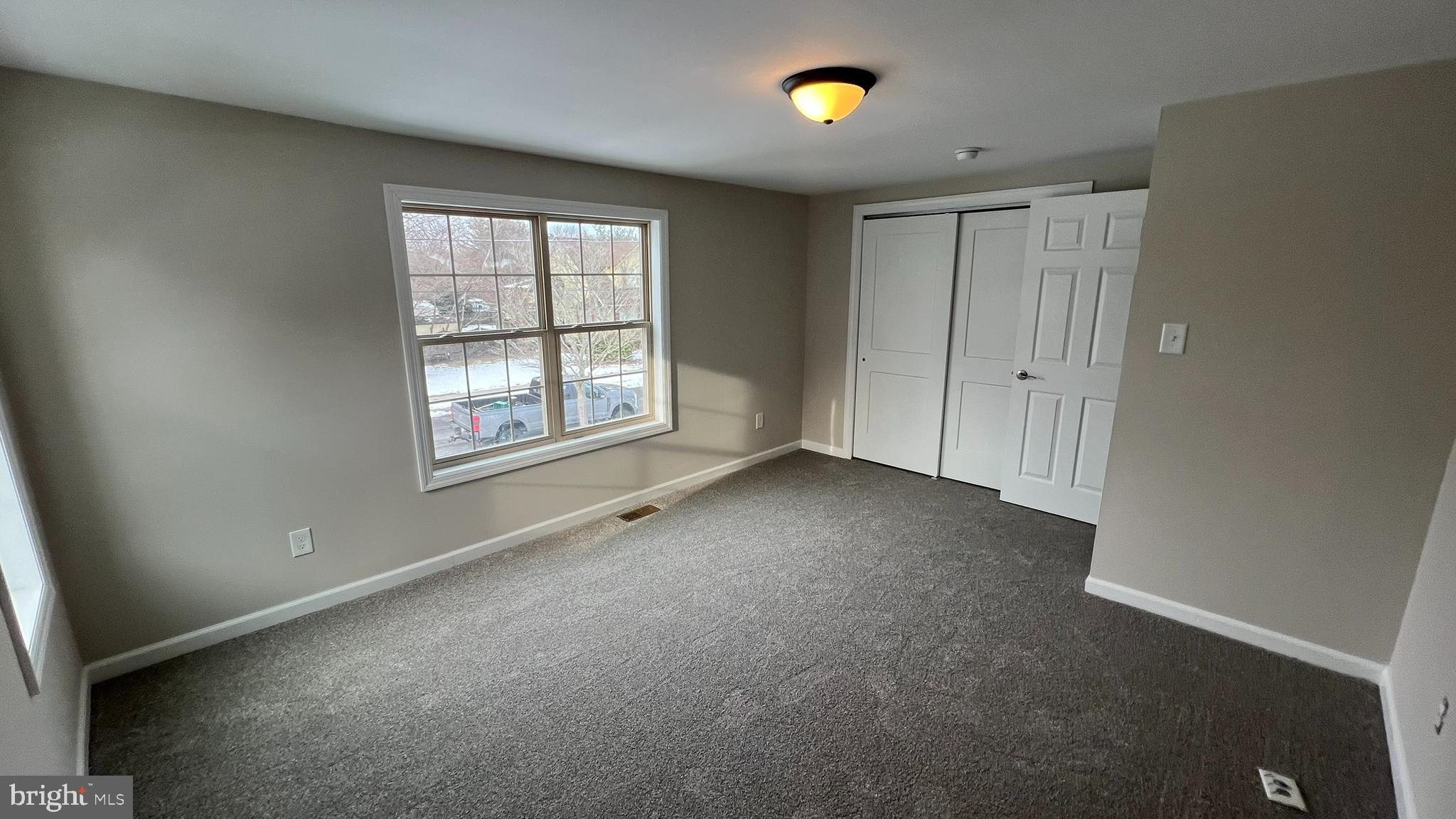 220 Harvard Avenue Stratford, NJ 08084 - Photo 27 of 33 an empty room with windows and closet