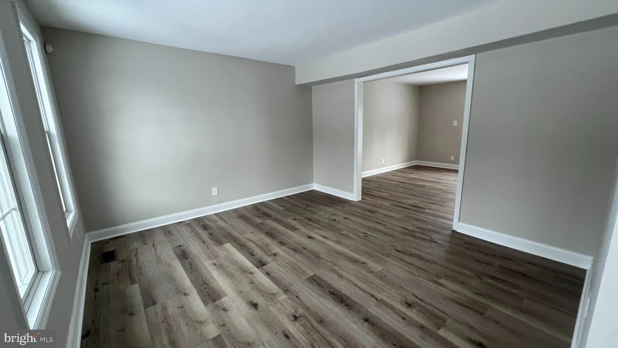 220 Harvard Avenue Stratford, NJ 08084 - Photo 7 of 33 wooden floor in an empty room