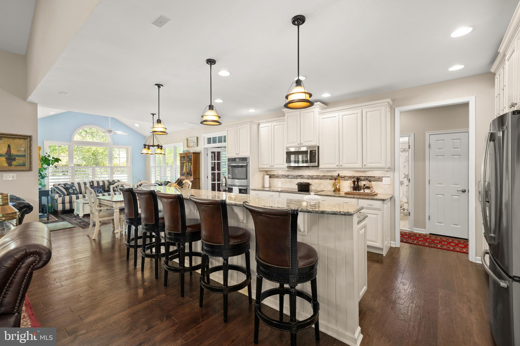 16624 Shoal Road Lewes, DE 19958 - Photo 11 of 67 Breakfast Bar seats five & pendant lighting