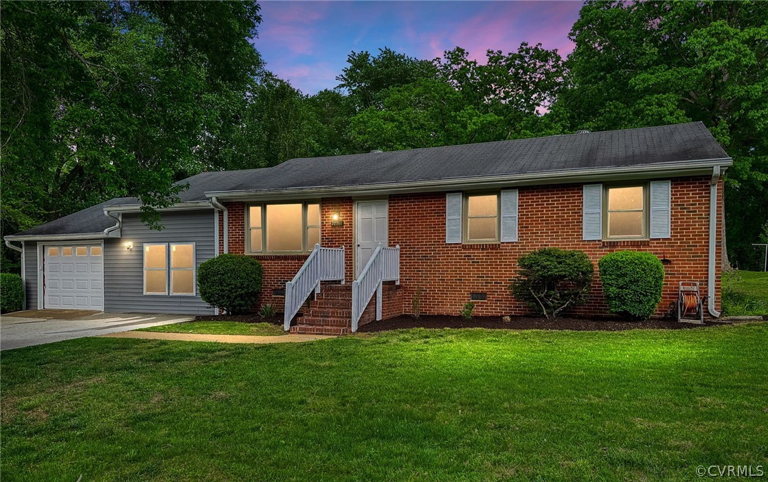 10511 Lunswood Road Chester, VA 23831 - Photo 1 of 27 View of front of home featuring attached garage an