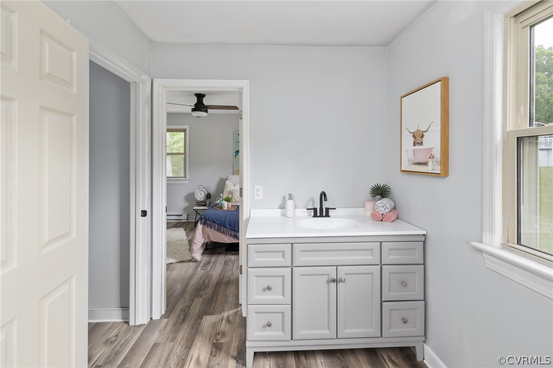 10511 Lunswood Road Chester, VA 23831 - Photo 26 of 27 Bathroom with wood-type flooring, plenty of natura