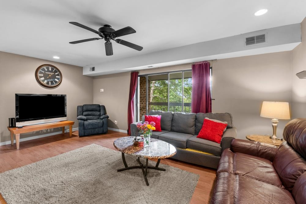1004 Sandlin Place, Unit E Raleigh, NC 27606 - Photo 15 of 26 Open Concept Living room