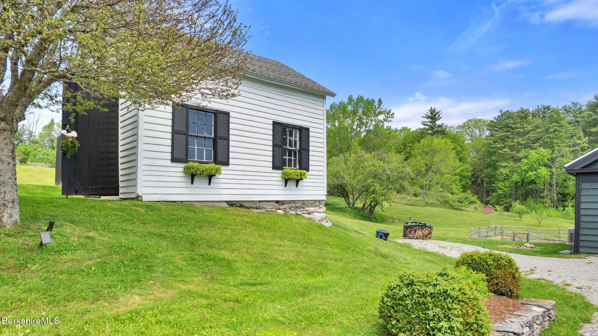 2650 Swamp Road Richmond, MA 01254 - Photo 45 of 49 a front view of a house with a yard