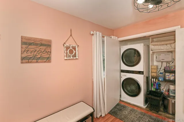 a utility room with dryer and washer