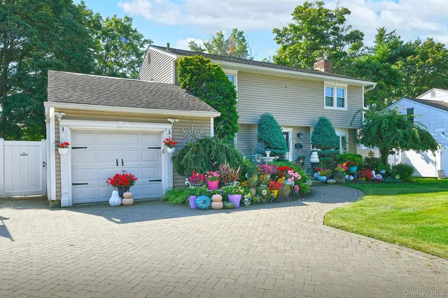 a view of a house with the garden and plants