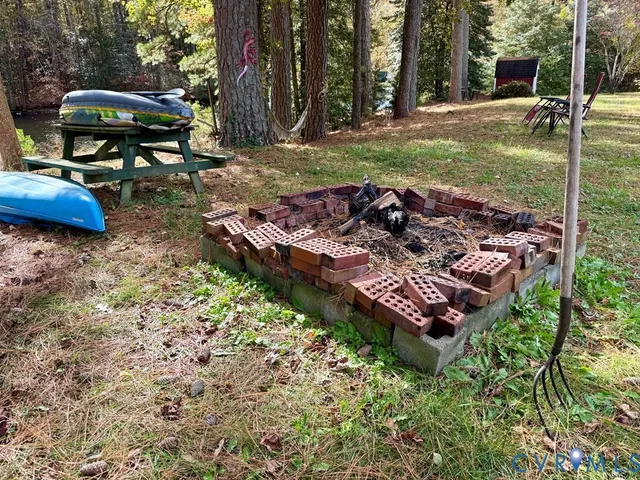 a view of a chairs and table in the patio
