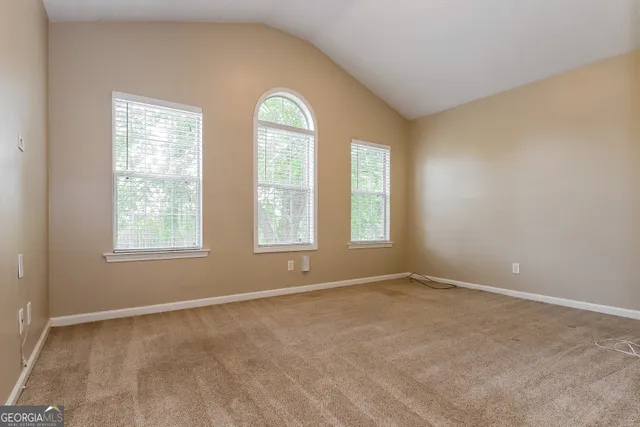 an empty room with windows