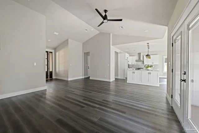 a view of a livingroom with wooden floor