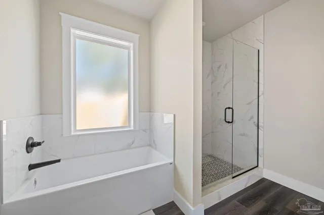a bathroom with a double vanity sink and mirror