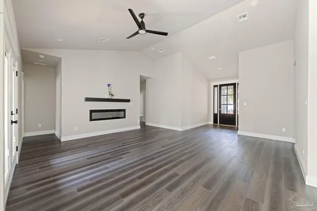 a view of a livingroom with wooden floor