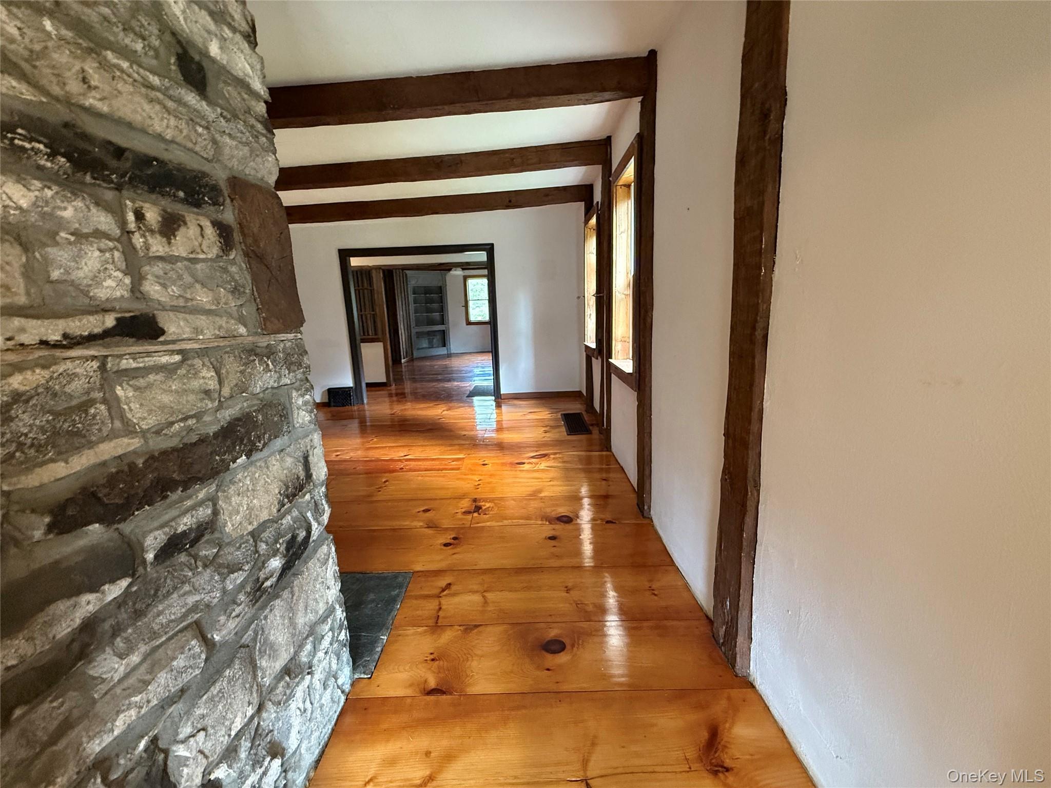 241 White Bridge Road Middletown, NY 10940 - Photo 17 of 29 Hall with hardwood / wood-style floors and beamed ceiling