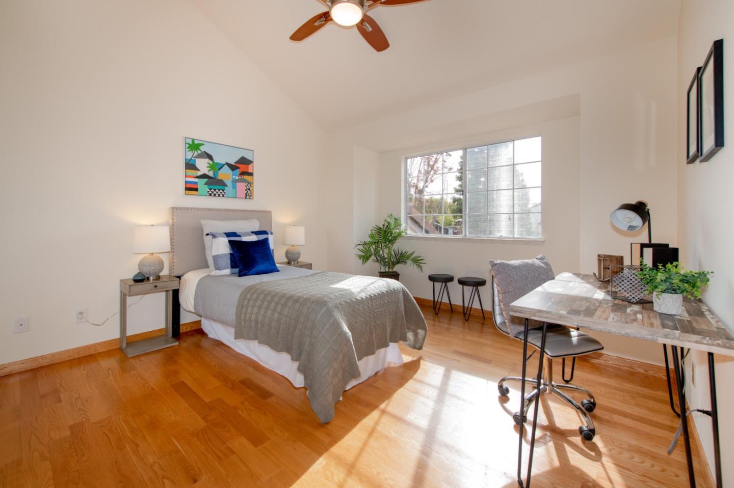 2353 Glenview Drive Milpitas, CA 95035 - Photo 15 of 20 a bedroom with a bed and a chandelier