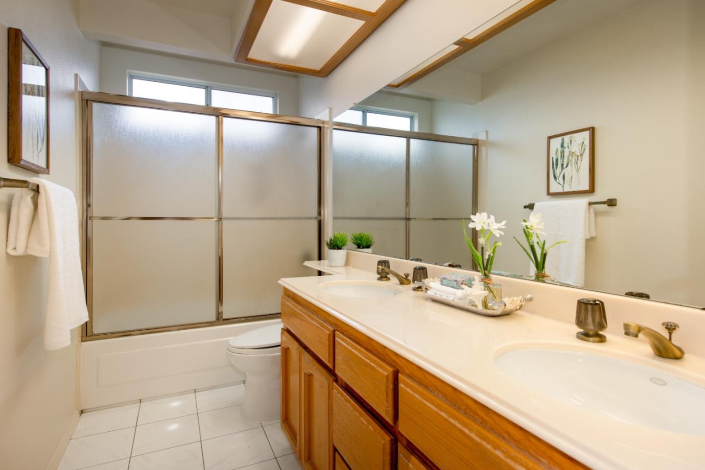 2353 Glenview Drive Milpitas, CA 95035 - Photo 16 of 20 a bathroom with a sink and a mirror
