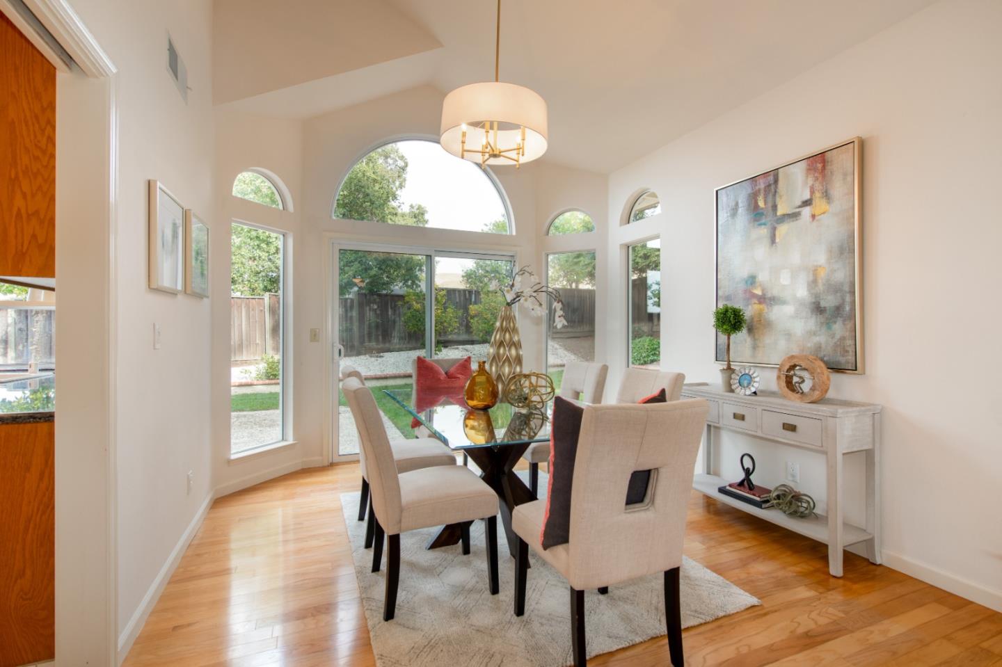 2353 Glenview Drive Milpitas, CA 95035 - Photo 5 of 20 a view of a dining room with furniture a chandelier and wooden floor