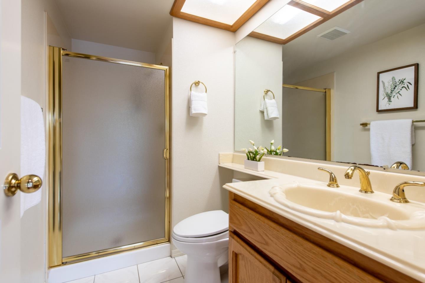 2353 Glenview Drive Milpitas, CA 95035 - Photo 10 of 20 a bathroom with a sink and a mirror