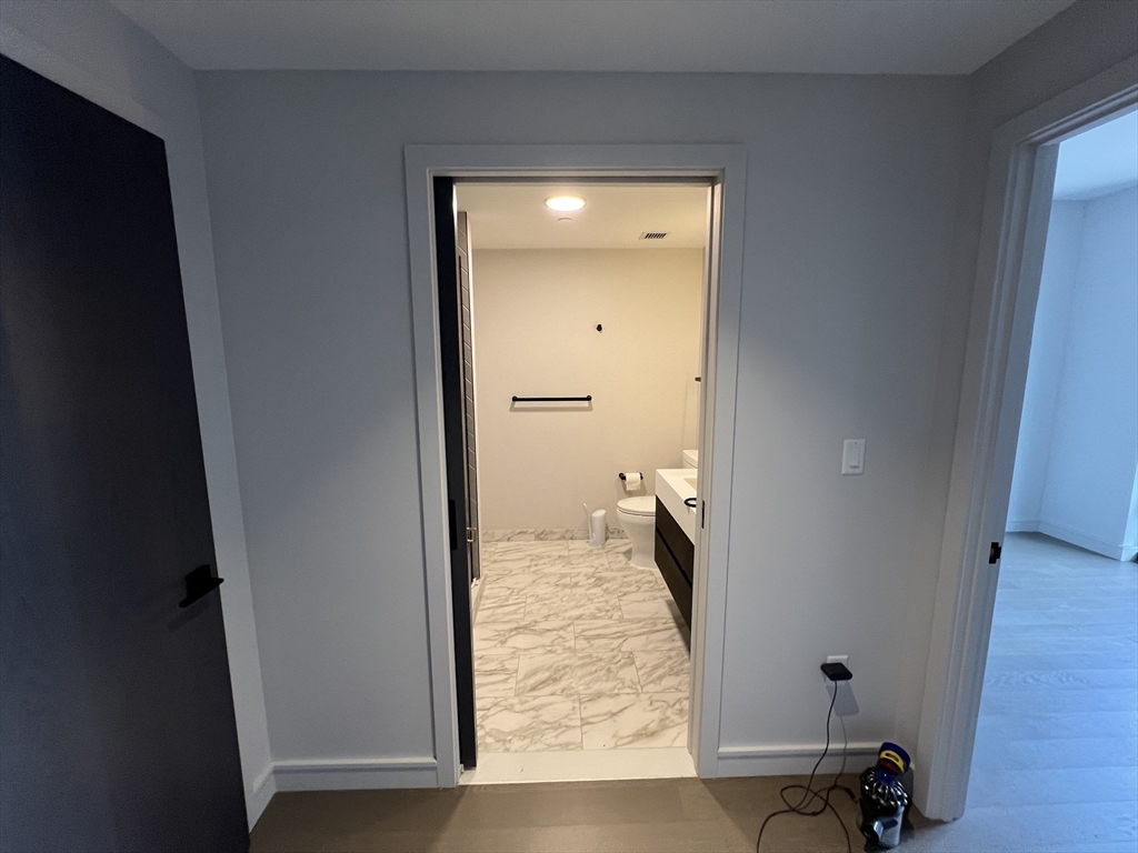 55 Lagrange Street, Unit 1108 Boston, MA 02116 - Photo 11 of 33 a view of a bathroom with a sink