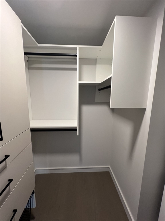 55 Lagrange Street, Unit 1108 Boston, MA 02116 - Photo 20 of 33 a view of walk in closet with clothes