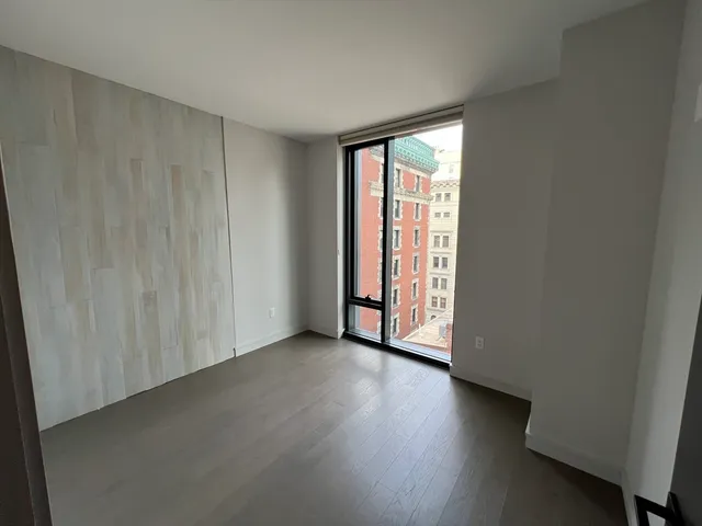 an empty room with windows