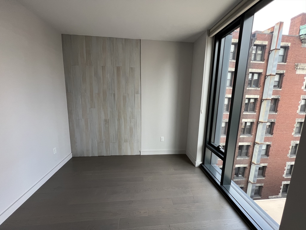 55 Lagrange Street, Unit 1108 Boston, MA 02116 - Photo 22 of 33 an empty room with windows