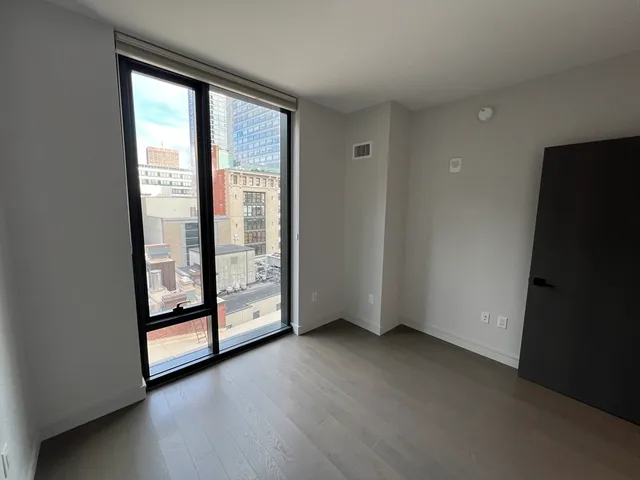 a view of hallway with closet