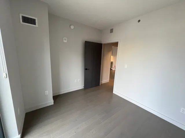 a view of a potted plant in front of a door