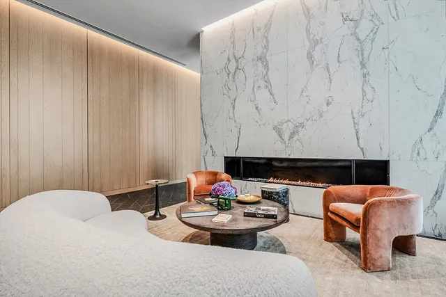 a kitchen with stainless steel appliances granite countertop a stove and a refrigerator