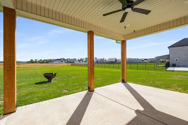 a view of a house with a big yard