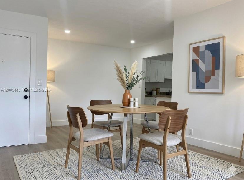 9006 Southwest 137th Street, Unit 18 Miami, FL 33176 - Photo 6 of 13 a view of a dining room with furniture