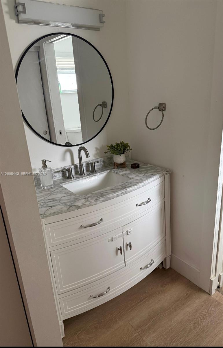 9006 Southwest 137th Street, Unit 18 Miami, FL 33176 - Photo 9 of 13 a bathroom with a sink and a mirror
