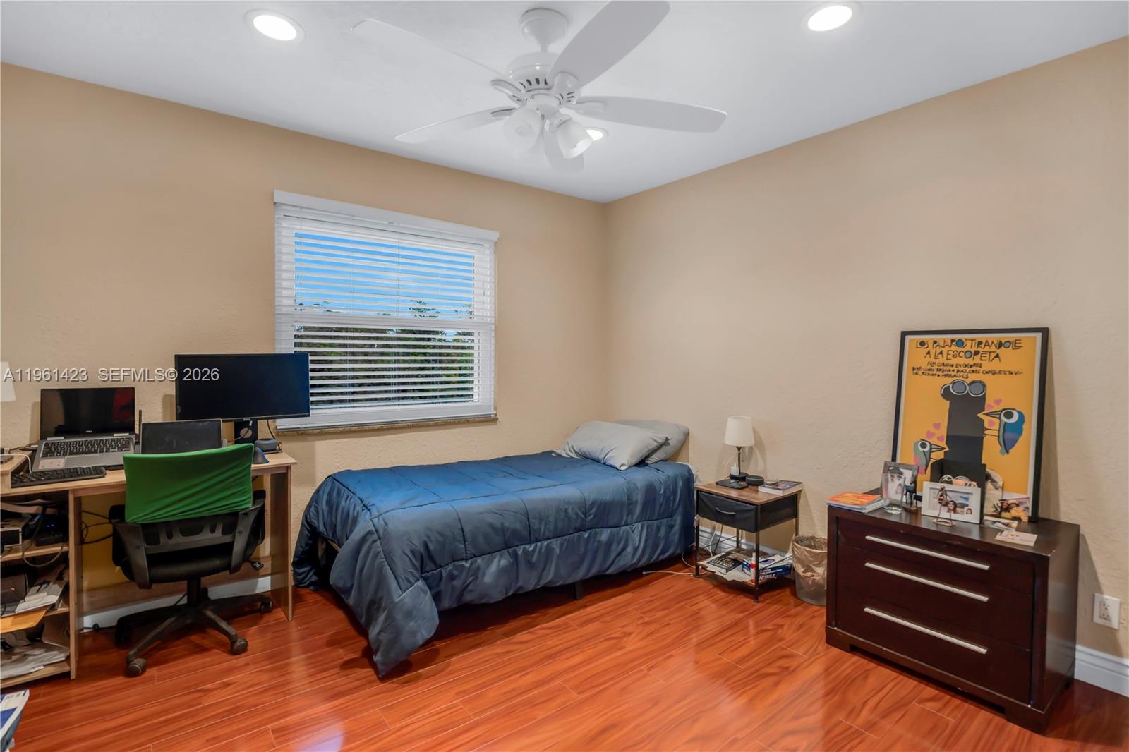 21451 Sawmill Court Boca Raton, FL 33498 - Photo 16 of 67 a bedroom with a bed and a desk
