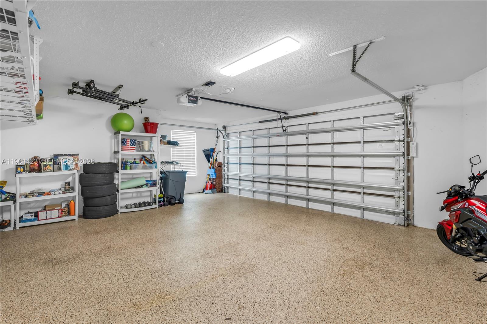 21451 Sawmill Court Boca Raton, FL 33498 - Photo 26 of 67 a view of a garage with storage