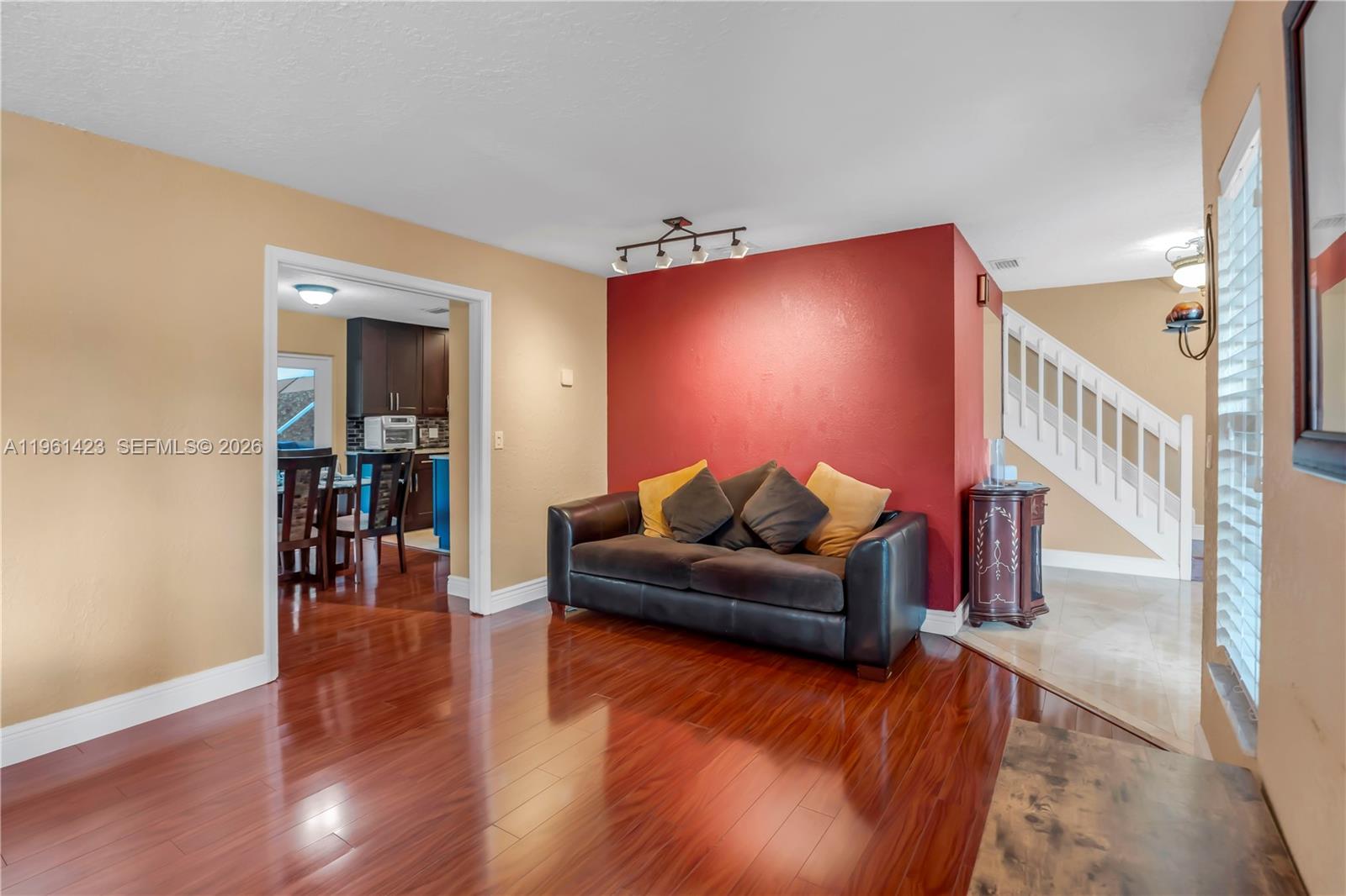 21451 Sawmill Court Boca Raton, FL 33498 - Photo 3 of 67 a living room with furniture and a wooden floor