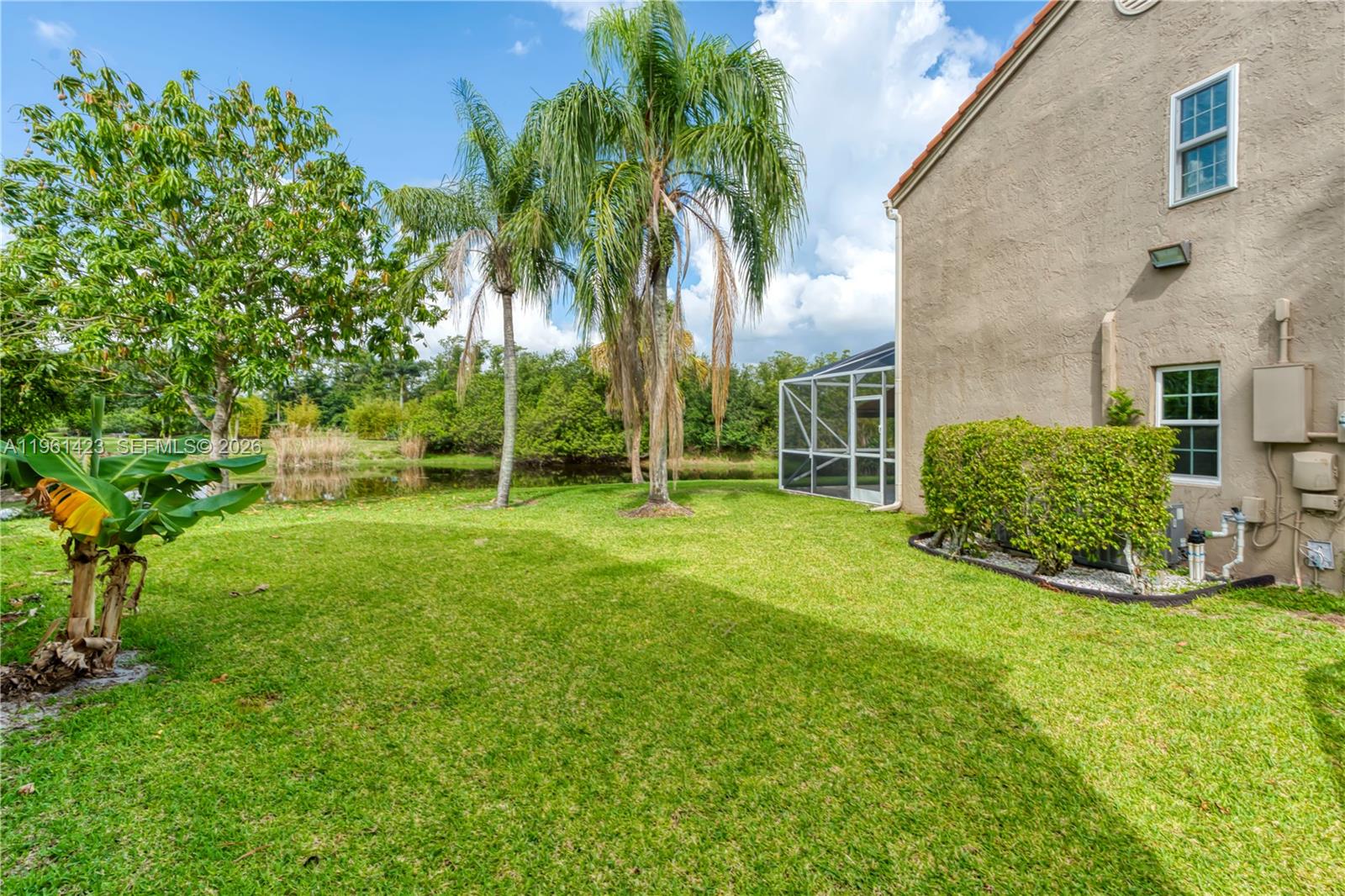 21451 Sawmill Court Boca Raton, FL 33498 - Photo 42 of 67 a view of a house with backyard