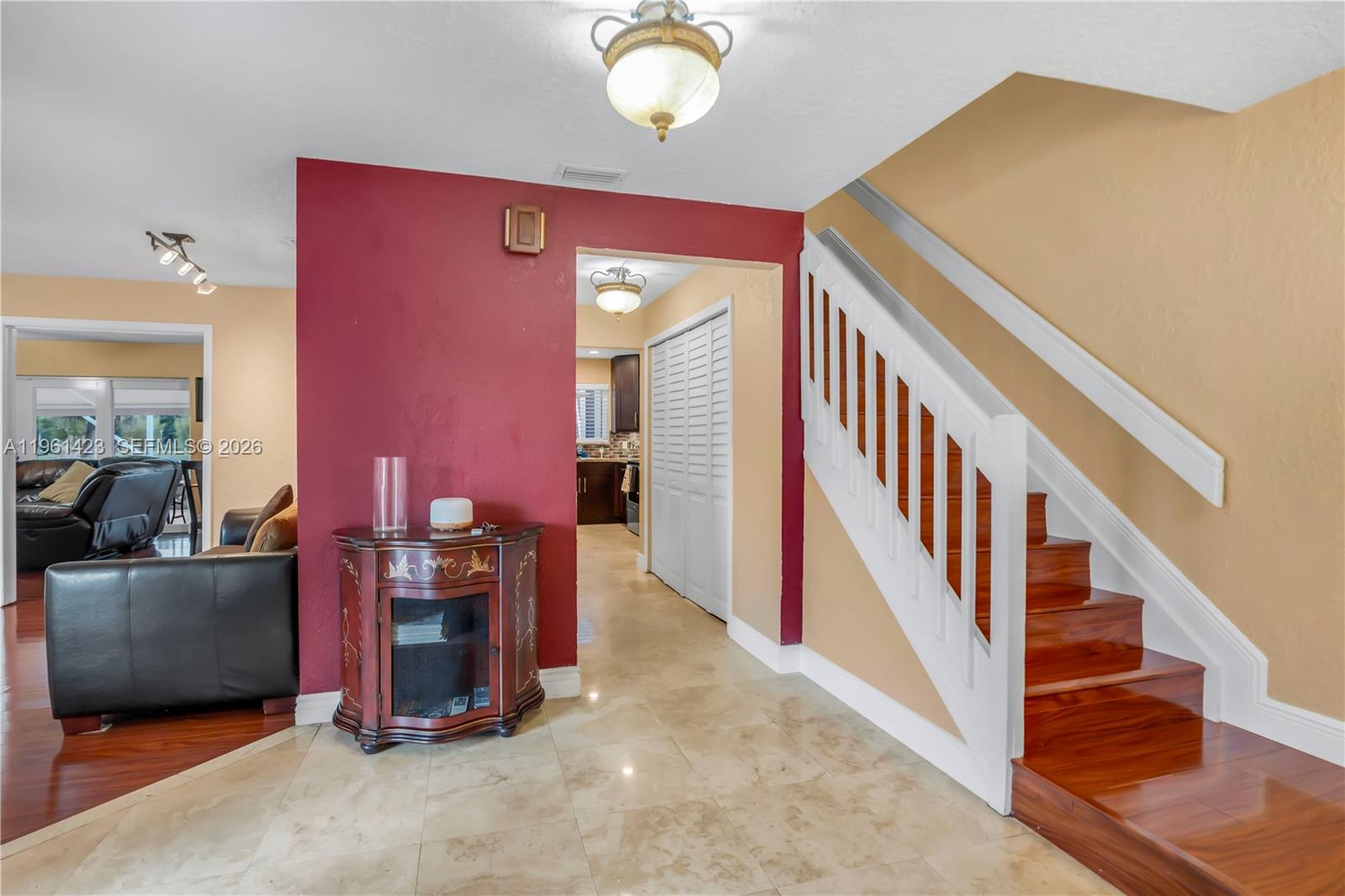 21451 Sawmill Court Boca Raton, FL 33498 - Photo 5 of 67 a view of a livingroom with furniture and staircase