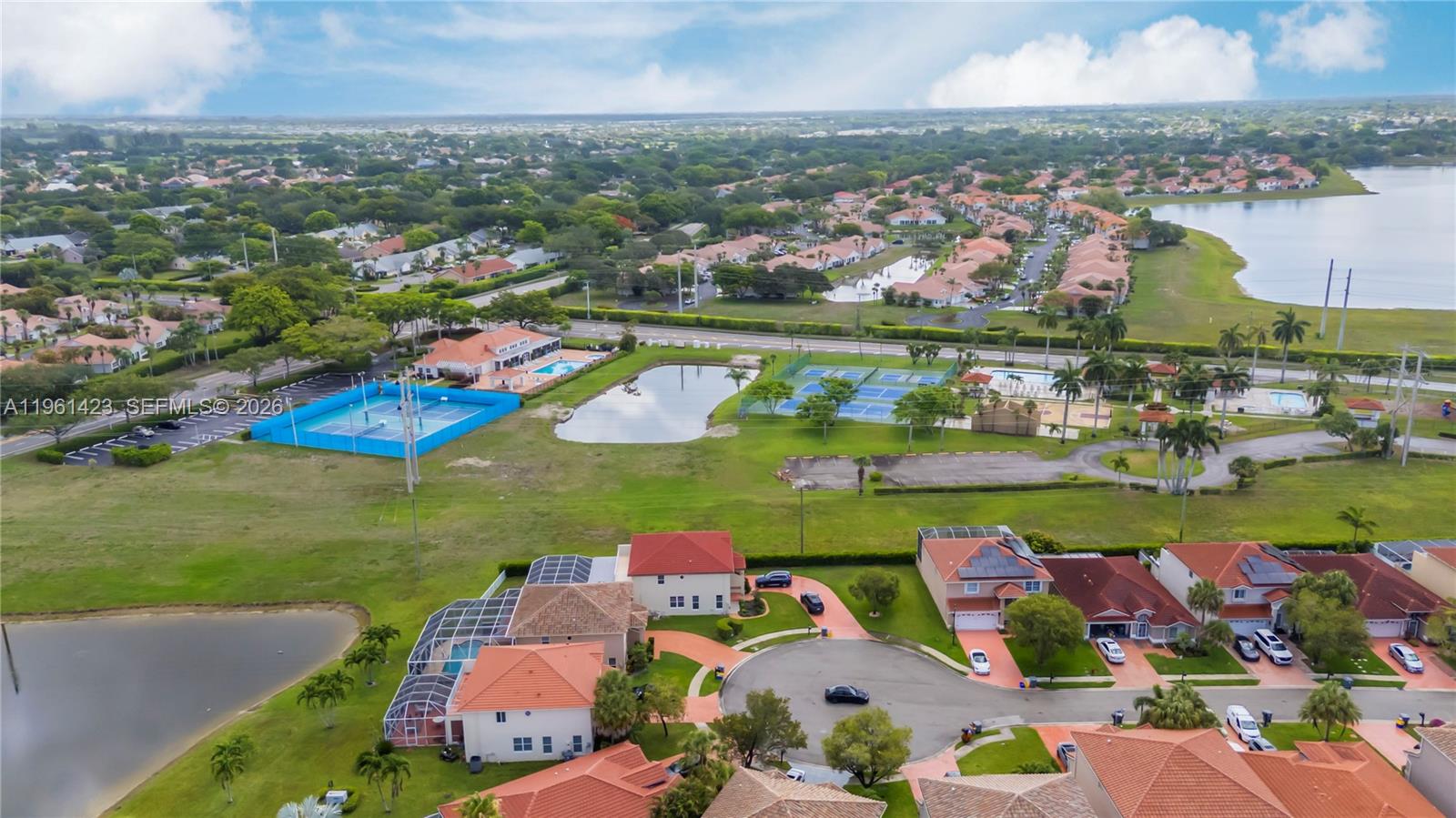 21451 Sawmill Court Boca Raton, FL 33498 - Photo 57 of 67 an aerial view of a houses and an outdoor space
