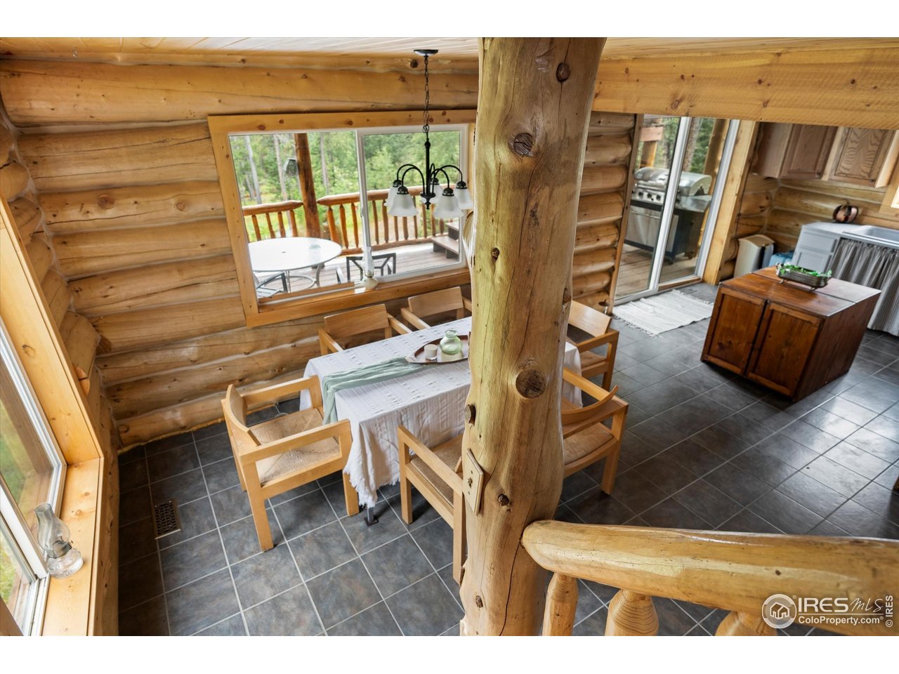 122 Elk Way Drake, CO 80515 - Photo 17 of 43 a view of living room with furniture and wooden floor