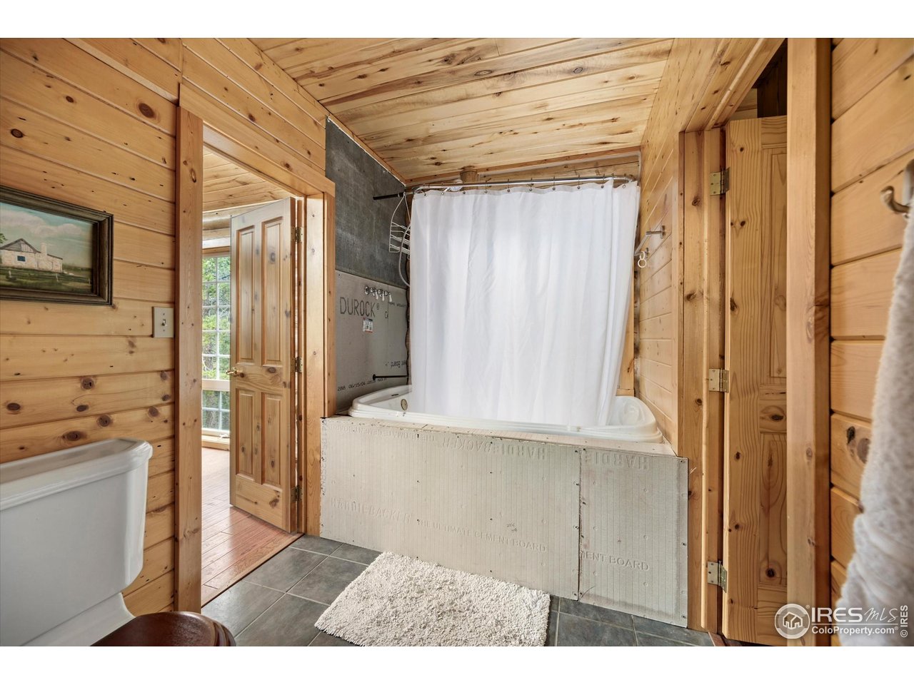 122 Elk Way Drake, CO 80515 - Photo 23 of 43 a view of bathroom with a shower and a sink