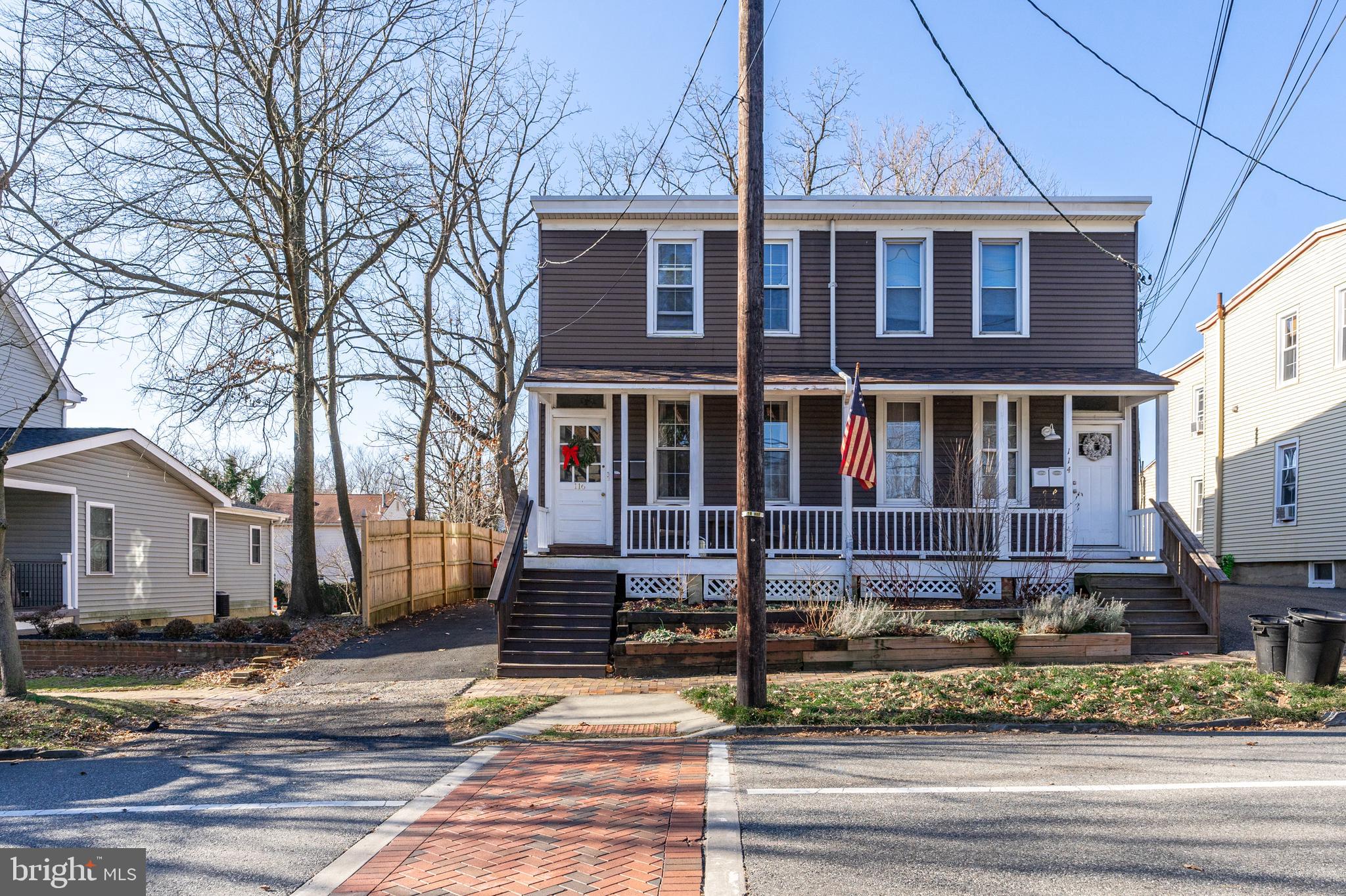 116 Potter Street Haddonfield, NJ 08033 - Photo 1 of 29 a front view of a house with a yard