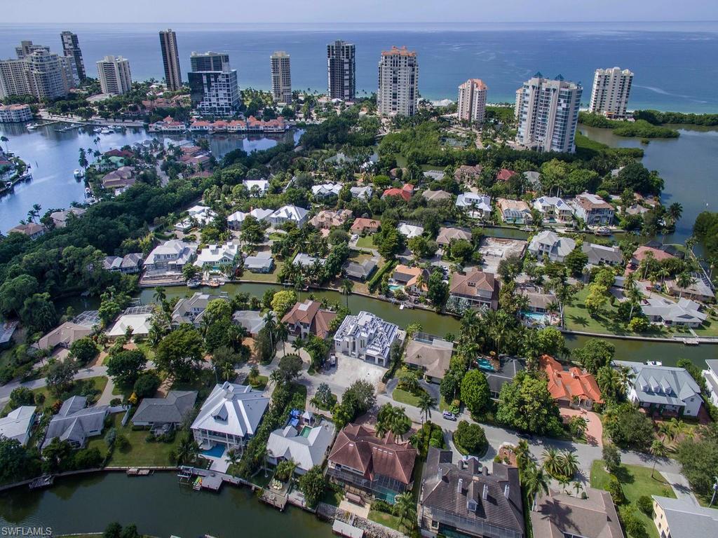 5138 Starfish Avenue Naples, FL 34103 - Photo 13 of 17 a view of a city with tall buildings