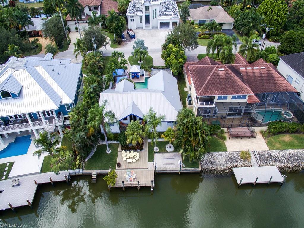 5138 Starfish Avenue Naples, FL 34103 - Photo 14 of 17 an aerial view of a house with a garden space