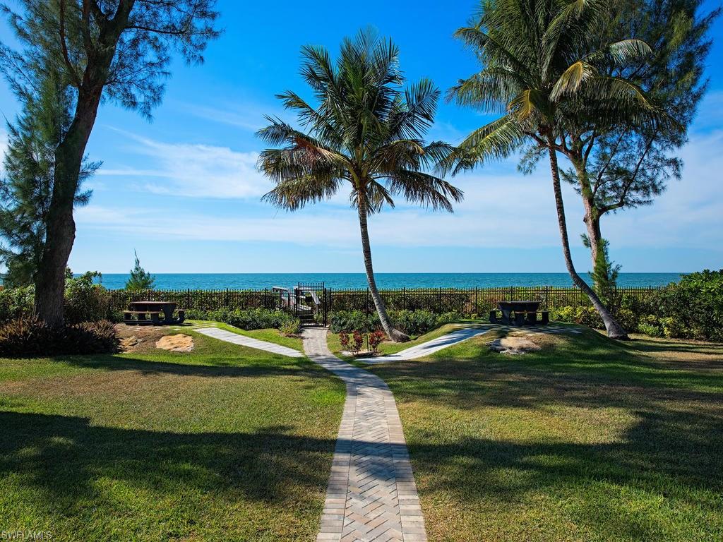 5138 Starfish Avenue Naples, FL 34103 - Photo 17 of 17 a view of a lake with a big yard