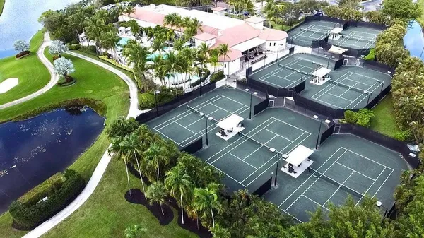an aerial view of a house with a garden