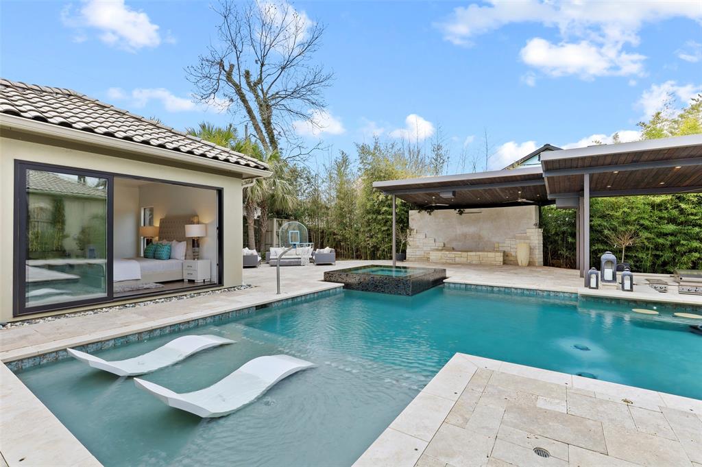 8647 Wingate Drive Dallas, TX 75209 - Photo 1 of 1 a view of a swimming pool with a patio