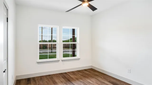 an empty room with windows
